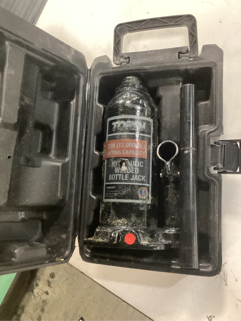 Condition photo showing As Is for torin black 6-ton steel hydraulic bottle jack