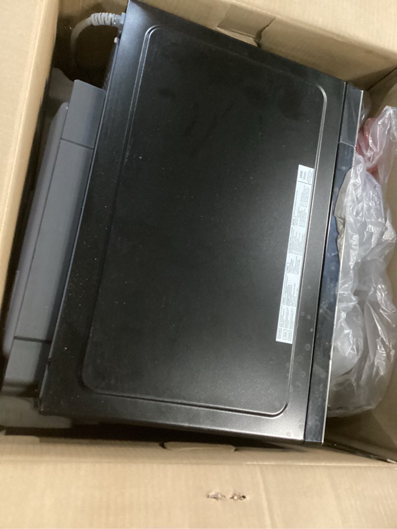 Condition photo showing Good Condition for GE GCST10A1WSS 4-in-1 Microwave Oven, 1,050 Watts Air Fryer, Broiler & Convection Mode, Child-Lock Technology, Kitchen Essentials for The Countertop or Dorm Room, 1.0 Cu. Ft, Stainless Steel