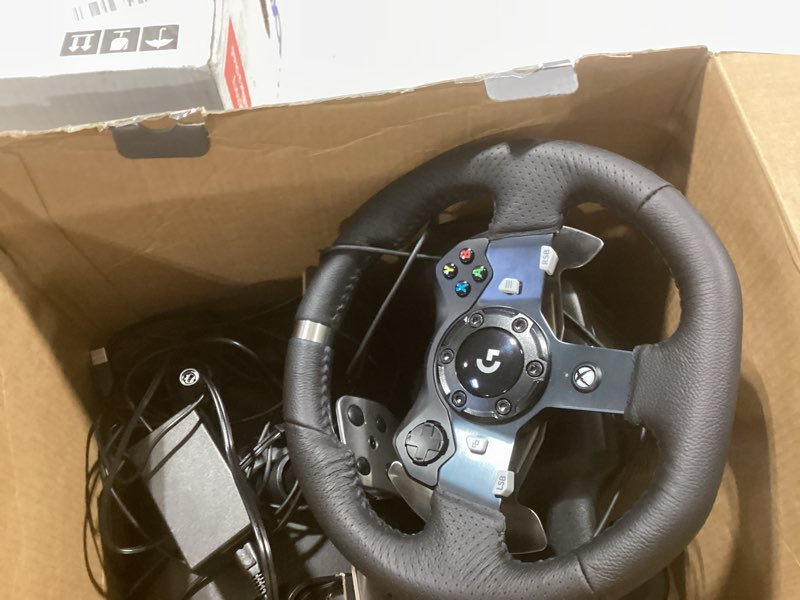 Condition photo showing Good Condition for Logitech G920 Driving Force Racing Wheel and Floor Pedals, Real Force Feedback, Stainless Steel Paddle Shifters, Leather Steering Wheel Cover for Xbox Series X|S, Xbox One, PC, Mac - Black Wheel Kit - Black