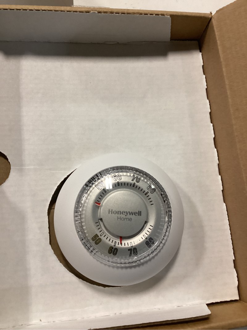 Condition photo showing As Is for Honeywell Home CT87K1004 The Round Heat Only Manual Thermostat,Large,White,Large Thermostat Round