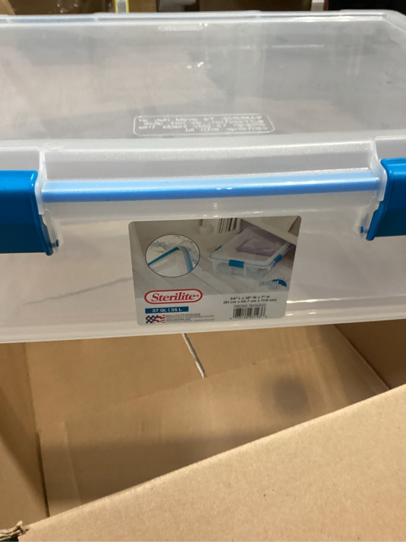 Condition photo showing As Is for sterilite 37 qt gasket box, stackable storage bin with latching lid and tight seal, plastic container to organize basement, clear base and lid, 1-pack