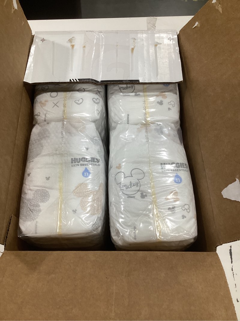 Condition photo showing Good Condition for huggies size newborn diapers, skin essentials baby diapers, size newborn (6-9 lbs), 76 count, packaging may vary