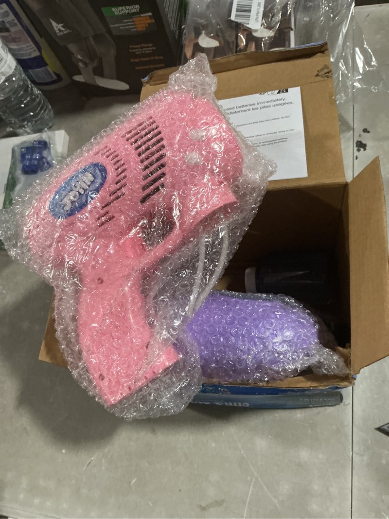 Condition photo showing Good Condition for joyin 2 bubble guns with 2 bottles refill solution, bubble machine gun for kids, toddlers, party favors, summer, outdoors activity, wedding, easter, birthday gift pink+purple