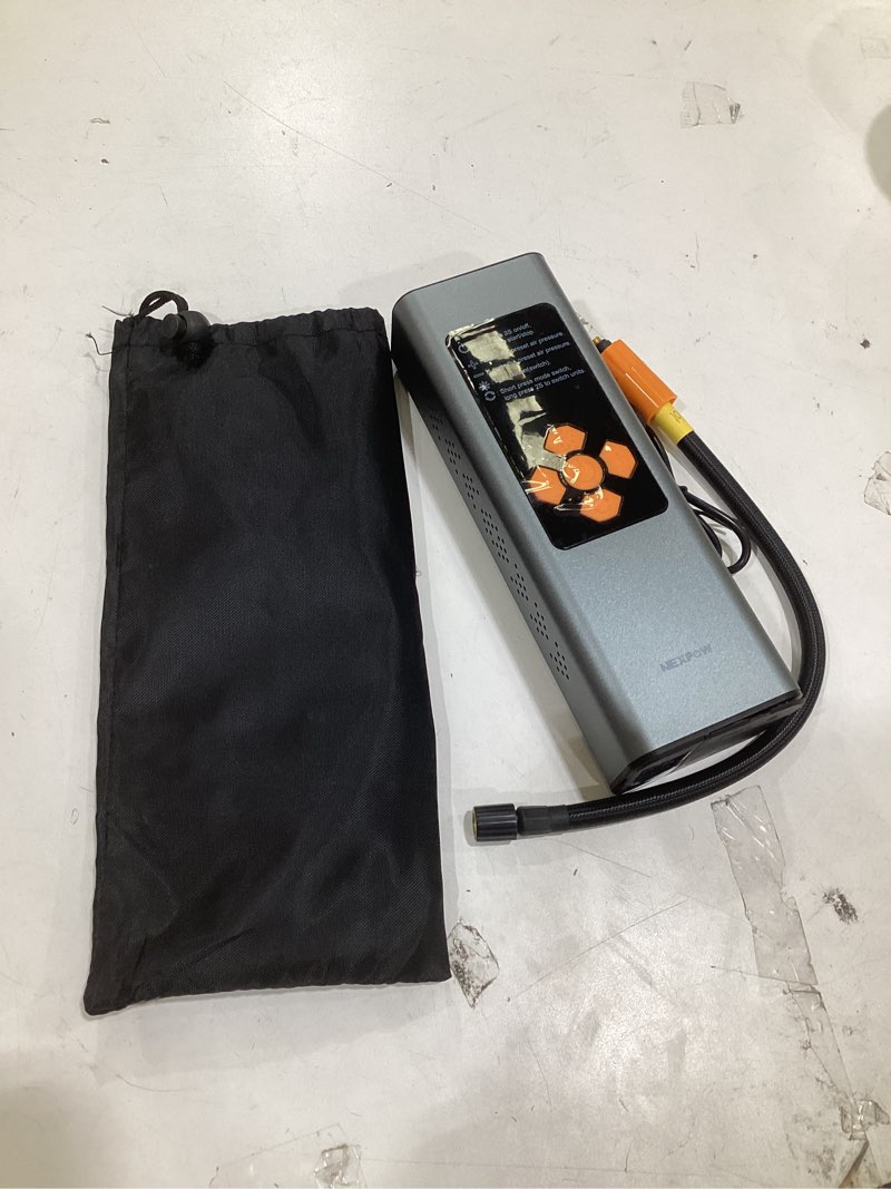 Condition photo showing As Is for Nexpow This item is a Reyke portable cordless tire inflator and air compressor.  