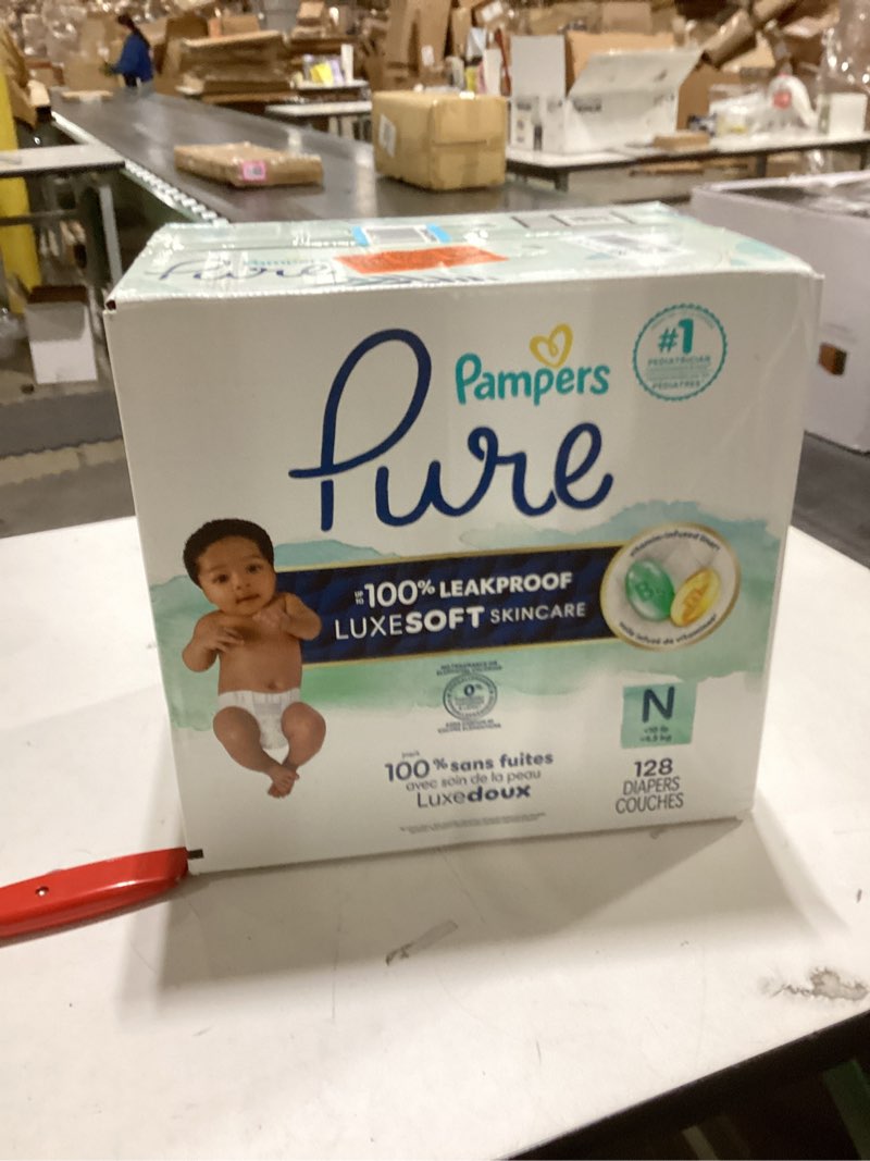 Condition photo showing New/Like New for Pampers Pure Protection Baby Diapers, Size 0 (10 lbs ), 128 Count, Up to 100% Leakproof, Premium Plant-based Skin Protection, Hypoallergenic Soft Diapers Newborn 128