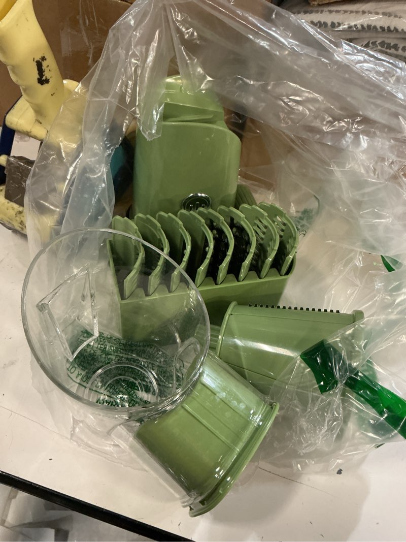 Condition photo showing As Is for Pukomc Rotary Cheese Grater with Handle- 5 Blades, Suction Base, Mandoline Slicer & Veg Shredder with Blade Storage Box(Green)