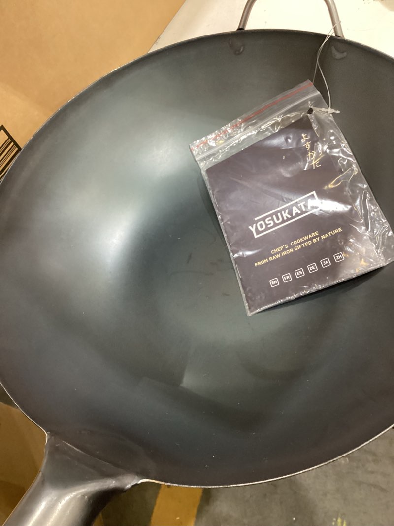 Condition photo showing New/Like New for yosukata 13.5” blue carbon steel wok pan – pre-seasoned flat bottom wok compatible with open fire, gas, electric, ceramic, induction cooktops -traditional chinese pan for stir fry, bbq, grill, camping