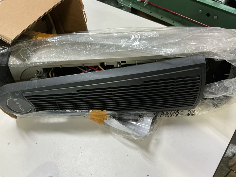 Condition photo showing As Is for (Similar)Lasko Tower Space Heater Indoor, Compact Electric Heaters for Indoor Use, Small Space Heater with Remote, Ideal Lasko Space Heaters for Indoor Use, 22.5 Inches, Grey/Black, 1500W, 751320 Grey/Black Heater