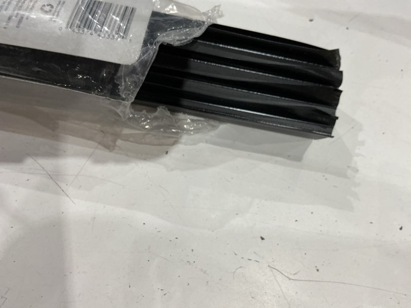 Condition photo showing As Is for m-d building products 43339 36 in. black vinyl cinch® u-shape slide-on under door seal