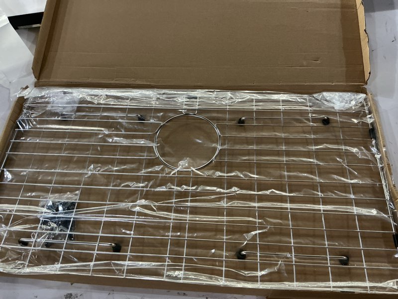 Condition photo showing Good Condition for sink protector grid, sink grids for bottom of kitchen sink with corner radius 3/16",27-9/16" x 14-9/16" sink protector, stainless steel material (27.7"w x 14.7"d x 1"h) 27-9/16" x 14-9/16 (rear drain)