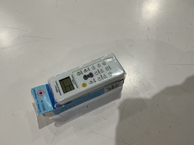 Condition photo showing Good Condition for universal ac remote control, 5000-in-1 multi-brand compatible, k-1028e model, lcd display
