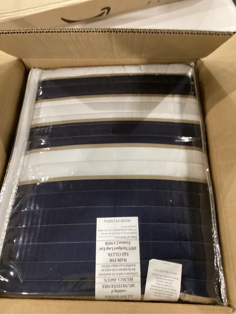 Condition photo showing New/Like New for comfort spaces quilt set trendy casual fun, vibrant color design, hypoallergenic all season, lightweight coverlet bedspread cozy kids bedding & sham twin/twin xl verone white blue stripe 2 piece twin/twin xl blue