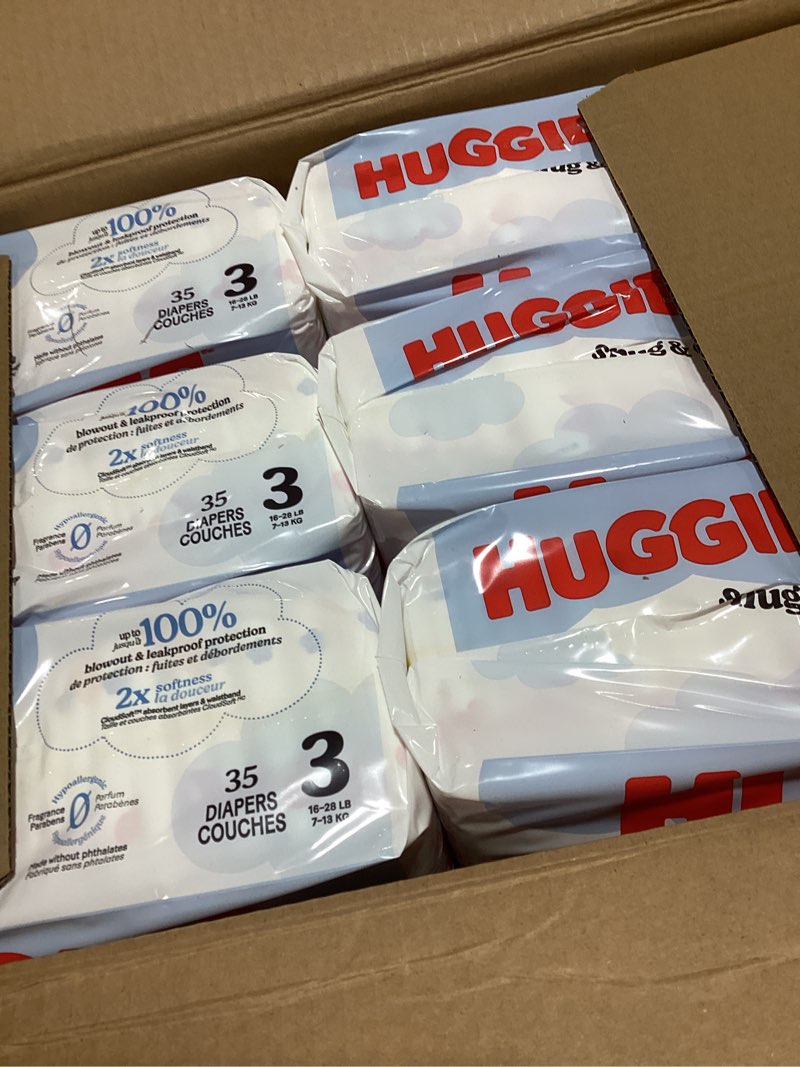 Condition photo showing New/Like New for Huggies Size 3 Diapers, Snug & Dry Baby Diapers, Size 3 (16-28 lbs), 210 Count (6 Packs of 35), Packaging May Vary Size 3 210