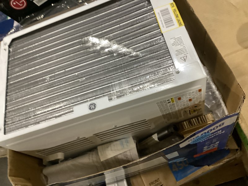 Condition photo showing As Is for 8,000 btu 115-volt smart window air conditioner for 350 sq. ft. in white with wi-fi and remote
