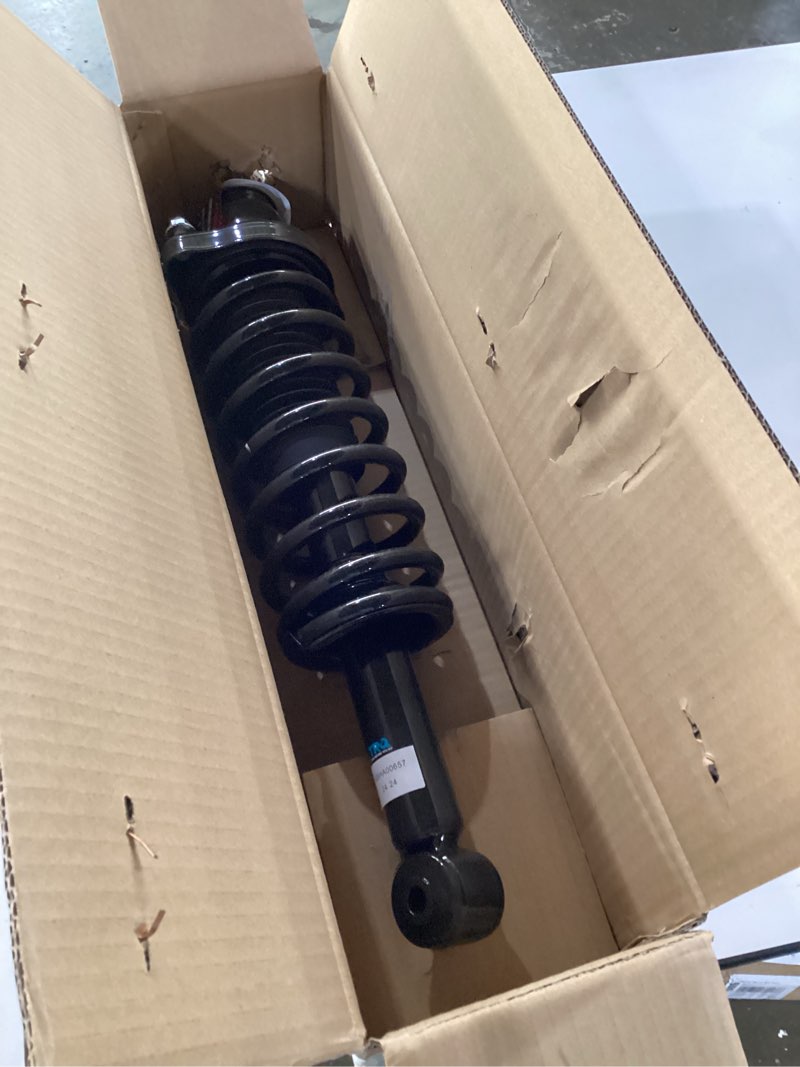 Condition photo showing New/Like New for TRQ Front Left Shock & Spring Strut Assembly Drivers Side Compatible with 16-23 Tacoma SCA27350