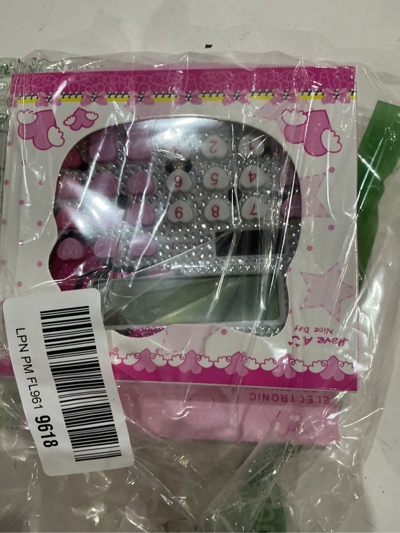 Condition photo showing As Is for hello kitty calculator, xinyu lighting creative and cute solar calculator, 12-digit lcd display, suitable for adults and children, solar and battery powered (white jewel model)
