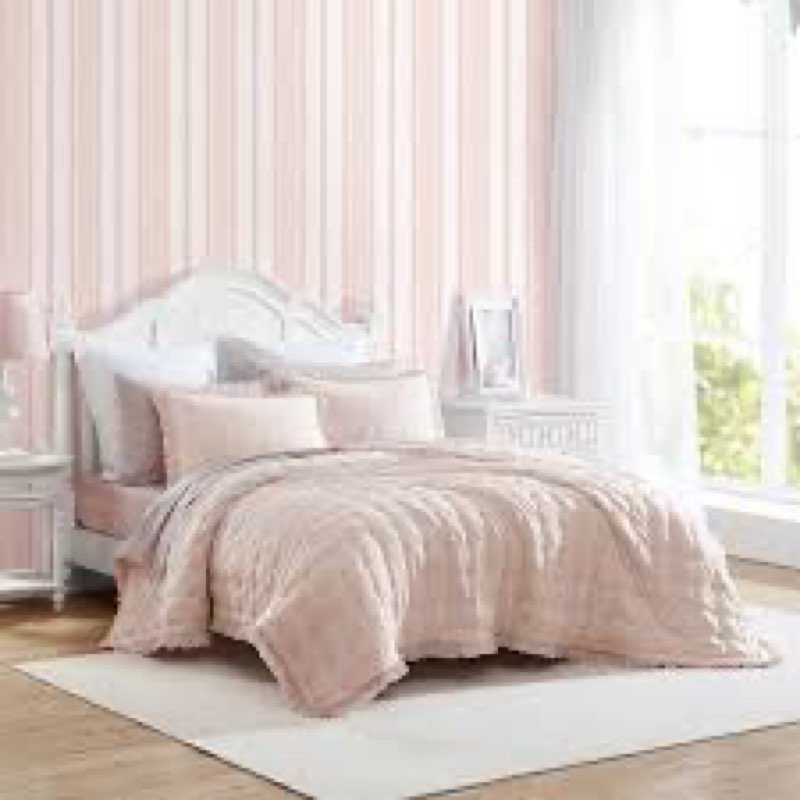 This is a Laura Ashley bedding product, likely a comforter or quilt, in a light pink or beige color. size 173cm x24cm 68inx88