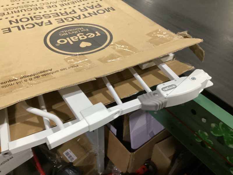 Condition photo showing New/Like New for regalo safety 38" baby gate for doorways & bottom of stairs, pressure mount design for babies, toddlers & pets, tested & safe for 30 years, american designed, american owned, white white 29-38.5"w x 30"h