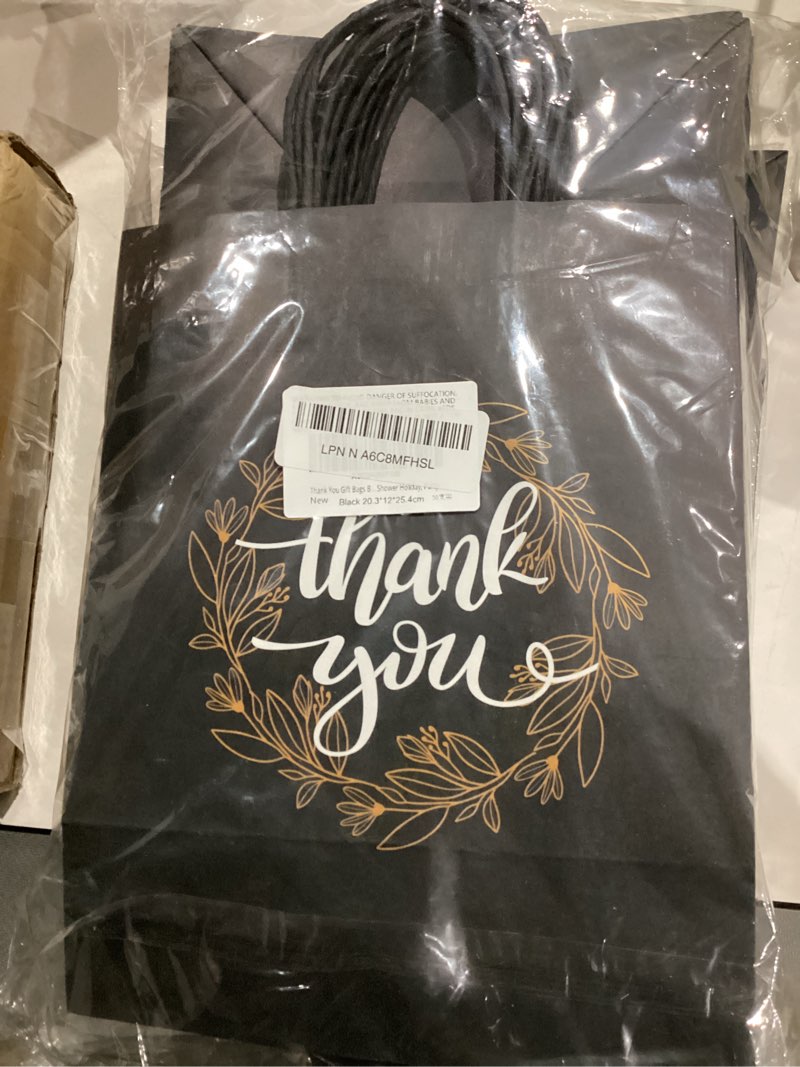 Condition photo showing New/Like New for qielser thank you gift bags bulk 50 pcs 8x4.75x10 inches medium black kraft paper bags with handles, tissue paper, and hang tags for retail shopping, wedding, baby shower holiday, party