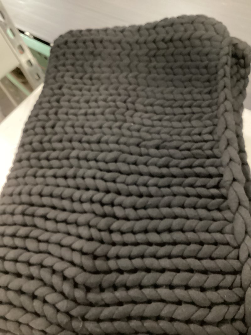 Condition photo showing Good Condition for YnM Original Hand Knitted Throw Blanket, Cosy & Breathable Chunky Knit Throw, no Pilling or Shedding, Stylish Home DÃ©cor Piece (Black, 50"x70")