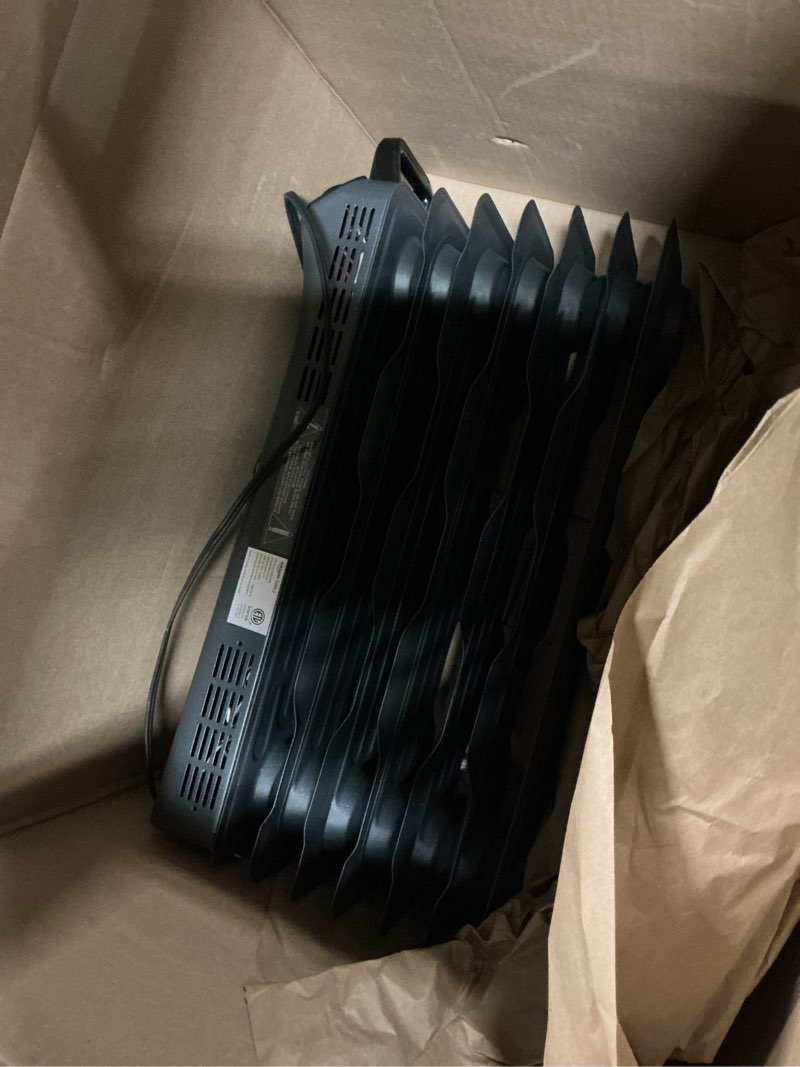 Condition photo showing Good Condition for Amazon Basics Oil Space Heater, Portable Radiator Heater with 7 Oil-Filled Fins for Indoor Use, 3 Heat Settings, Thermostat, Tip-Over Protection, ETL Safety Certificate, Manual Control, 1500W, Black
