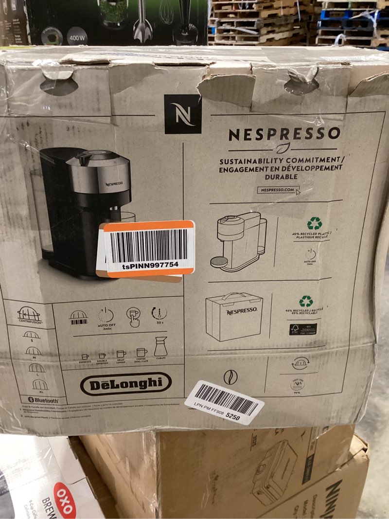 Condition photo showing As Is for nespresso vertuo next deluxe coffee and espresso machine by de'longhi, chrome machine only chrome