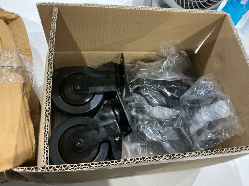 Condition photo showing Good Condition for these are heavy-duty swivel and rigid caster wheels with built-in brakes, commonly used for utility carts, workbenches, or tool cabinets