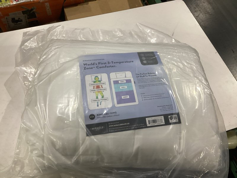 Condition photo showing New/Like New for miracle comforter king/cali king 104in x 92in