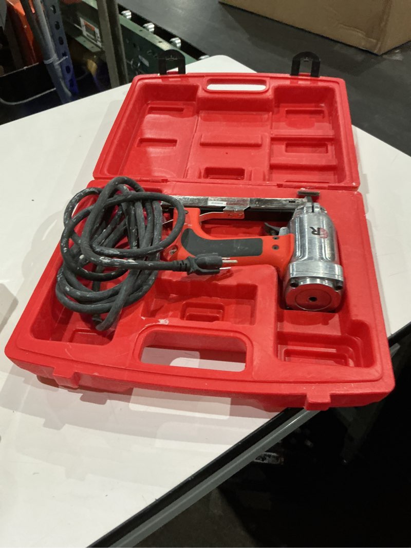 Condition photo showing As Is for roberts 10-600 3/16" crown, 120v, 15-amp, 20 gauge electric stapler with carrying case, red