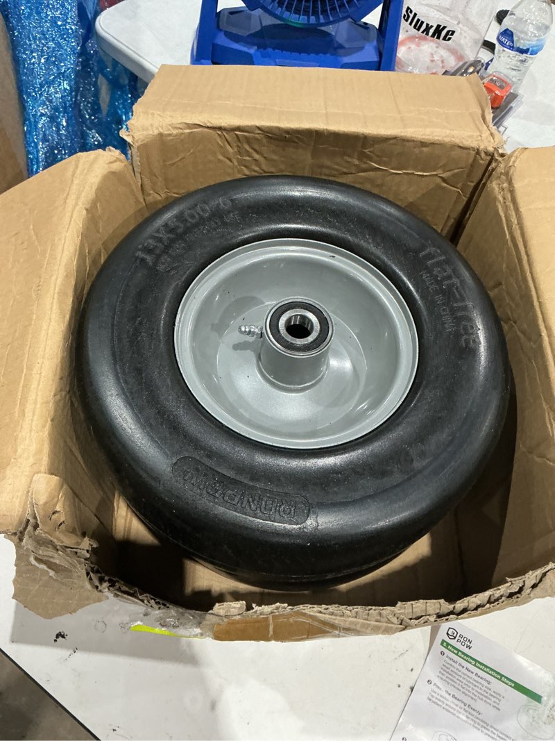 Condition photo showing As Is for sunbelt 13-in x 5.00-6 front wheel for riding mower/tractor