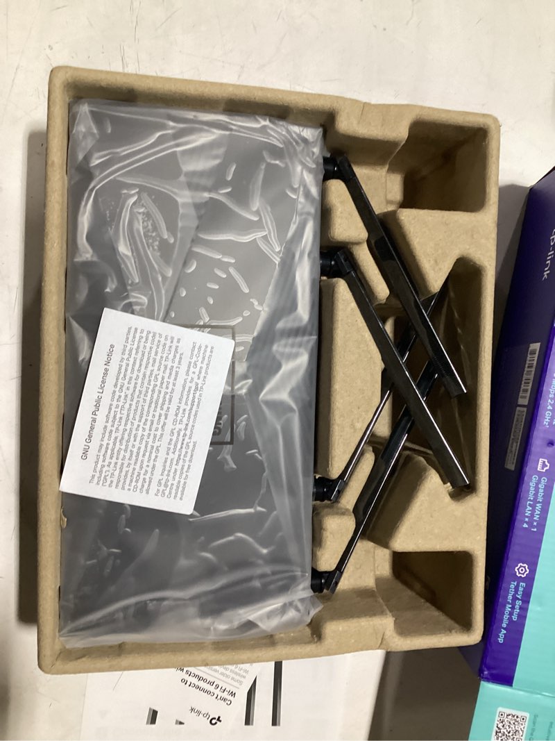 Condition photo showing New/Like New for archer ax1500 wi-fi 6 dual-band wireless network router