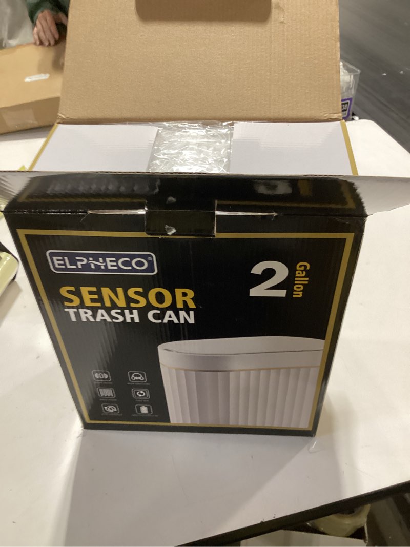 Condition photo showing New/Like New for ELPHECO Automatic Motion Sensor Trash Can - 2 Gallon Slimline for Bathroom, Bedroom, Kitchen, Office - White with Gold Trim Golden 2 gallon