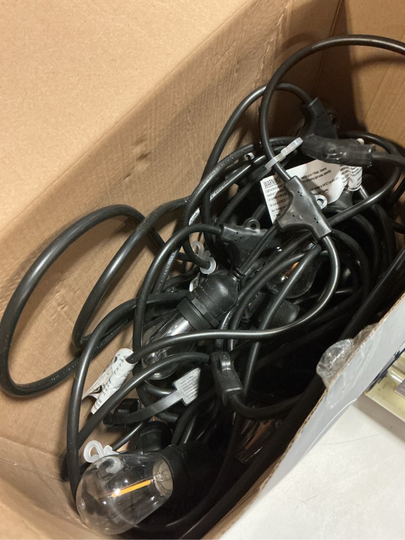 Condition photo showing As Is for harbor breeze 48-ft plug-in black indoor/outdoor string light with 24 white -light led edison bulbs