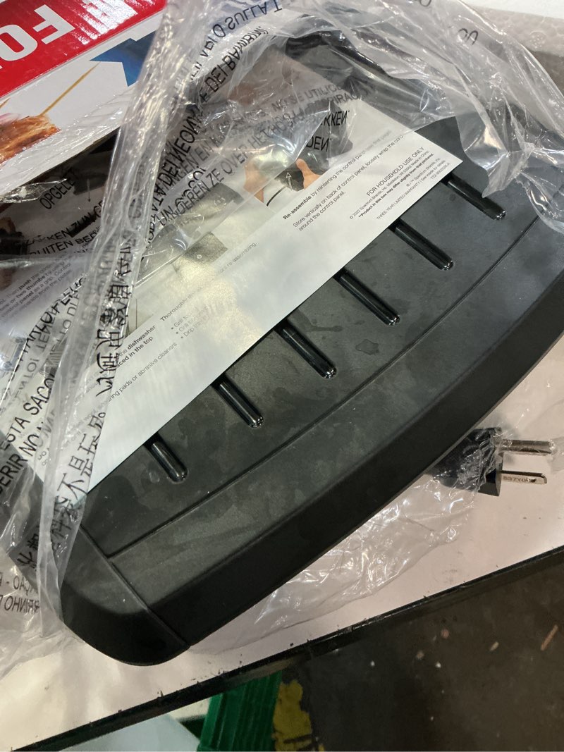 Condition photo showing As Is for george foreman® fully submersible™ grill, new dishwasher safe, wash the entire grill, easy-to-clean nonstick, black/grey 4-serving black/grey