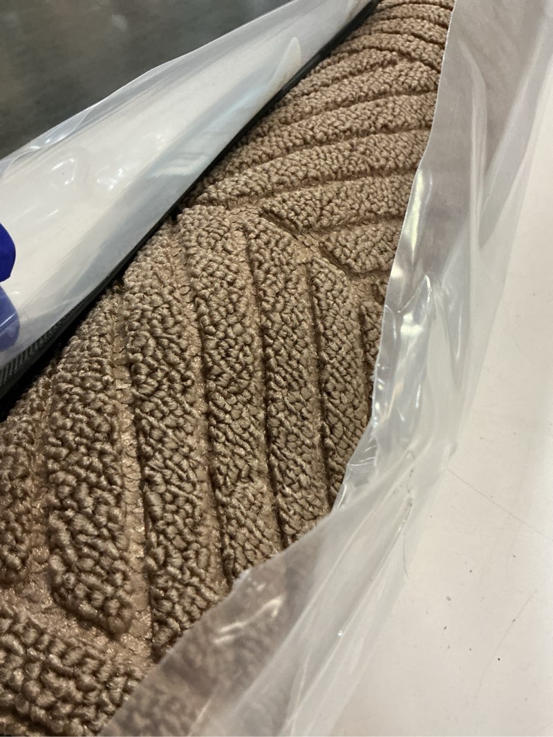 Condition photo showing Good Condition for smiry front door mat outside entrance, heavy duty sturdy natural rubber doormat, trap dirt and moisture, easy clean low profile mats for indoor outdoor entry, irregular triangle (29.5x17, brown) brown irregular triangle rectangular 29.5" x 17"