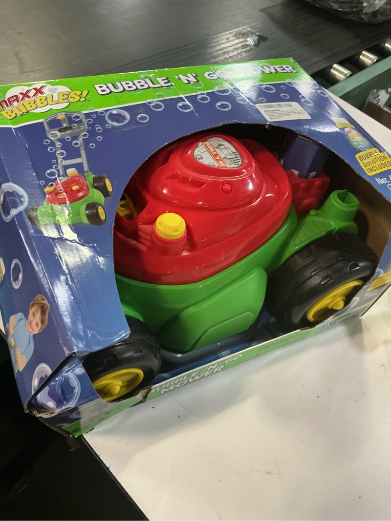 Condition photo showing As Is for maxx bubbles bubble-n-go mower, includes 4oz bubble solution, bubble lawn mower for toddlers, outdoor bubble toy for kids, no batteries required, red