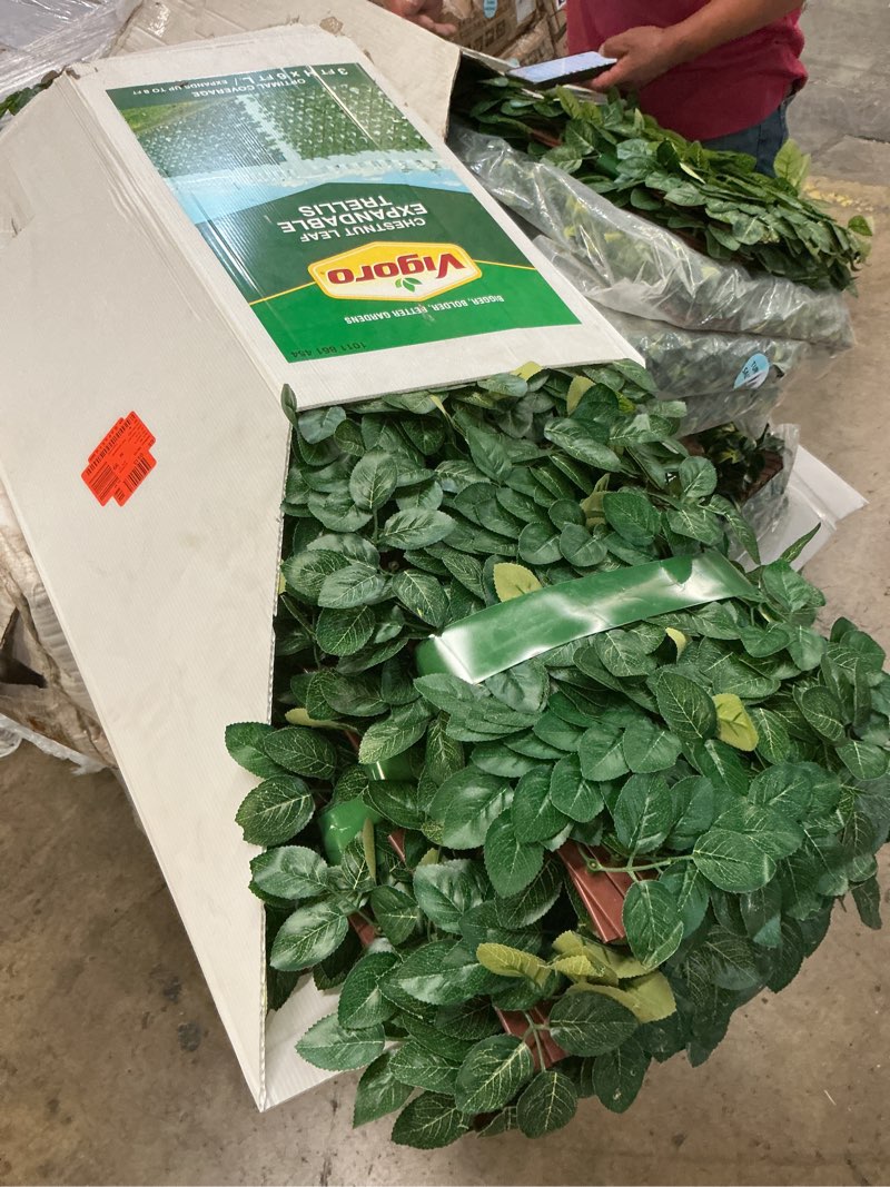 Condition photo showing As Is for (6 pack)36 in. green artificial pvc expandable trellis 36 in. x 72 in. chestnut leaves
