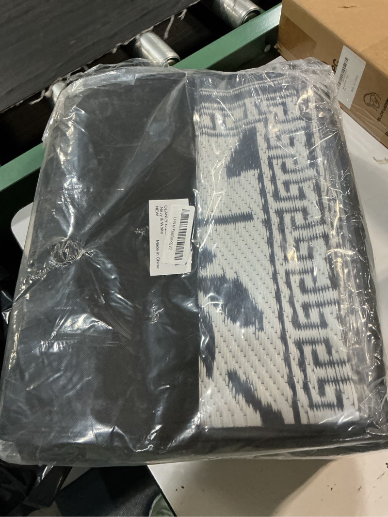 Condition photo showing Good Condition for olanly waterproof outdoor rug 5x8 ft, outdoor plastic straw rug with flower pattern, reversible rv mat for patio, camping, balcony, deck, backyard, navy & white navy blue & white 5' x 8' (rectangular)