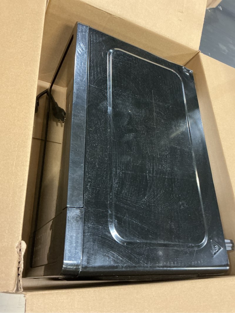 Condition photo showing As Is for FRIGIDAIRE EMW733BLACKAMZ 0.7 Cu. Ft. Microwave, Black