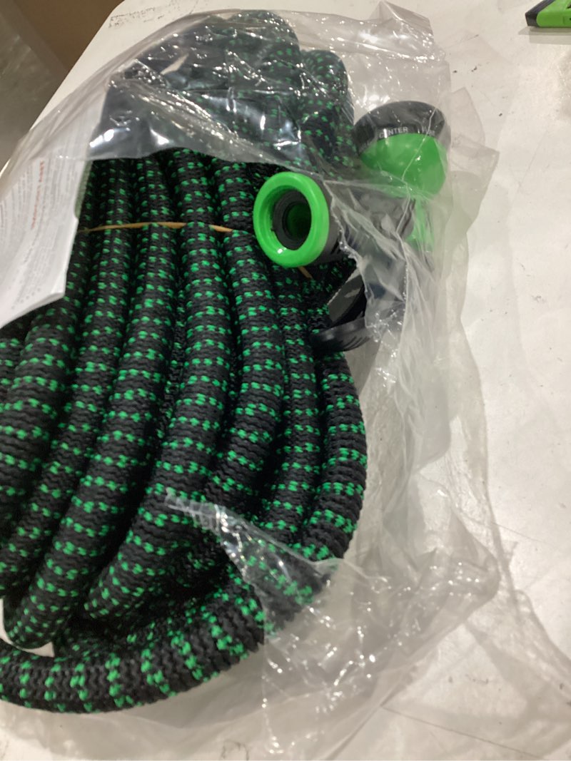 Condition photo showing As Is for flexi hose with 8 function nozzle, 50ft - lightweight expandable garden hose, no-kink flexibility, 3/4 inch solid brass fittings and double latex core - black and green green 50ft