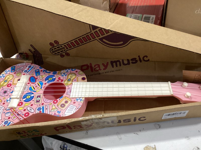 Condition photo showing Good Condition for LeeQee 21in Colorful Graffiti Ukulele Guitar for Kids, 4 Strings Kids Guitar Ukulele Musical Instruments Learning Educational Toys with Picks for 3 4 5 6 7 8 9 10 11 12 Toddler Boys Girls (Pink)