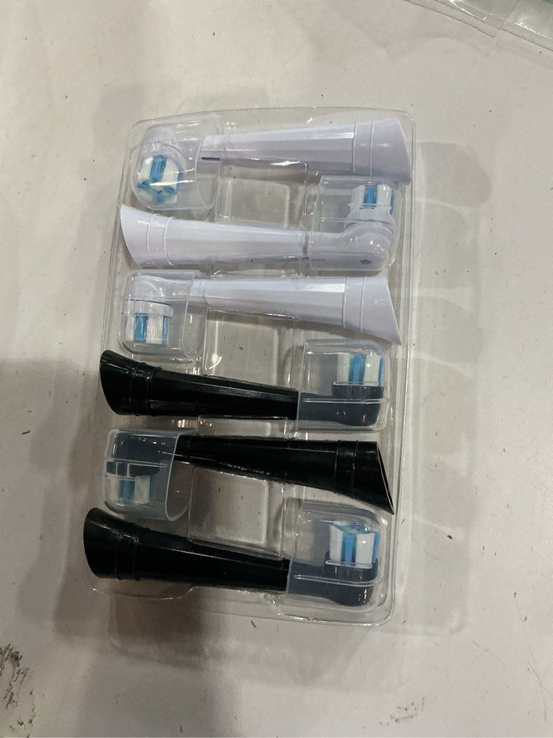 Condition photo showing New/Like New for 06 Pcs iO Replacement Heads Compatible with Oral B  Deep Clean Series Electric Toothbrush, Toothbrush Heads Compatible with Oral B iO with Medium Bristles Care Teeth (Black/White) Multi-colored 06  Count (Pack of 1)
