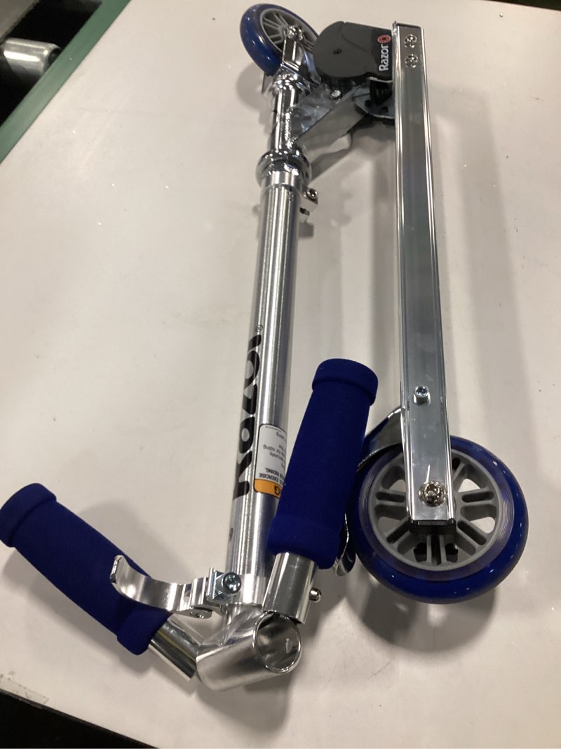 Condition photo showing As Is for Razor A Kick Scooter for Kids - Lightweight, Foldable, Aluminum Frame, and Adjustable Handlebars Blue