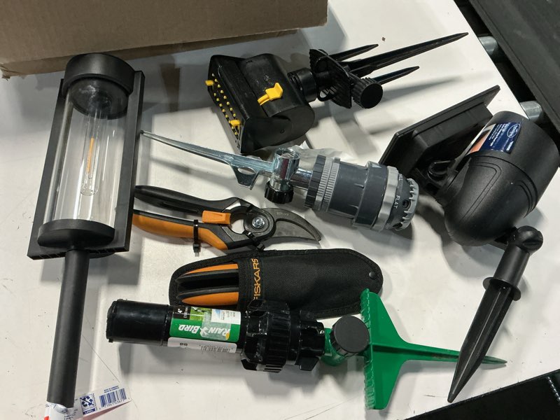 Condition photo showing As Is for assorted home improvement lot (small tools, screw, home accessories, etc.)