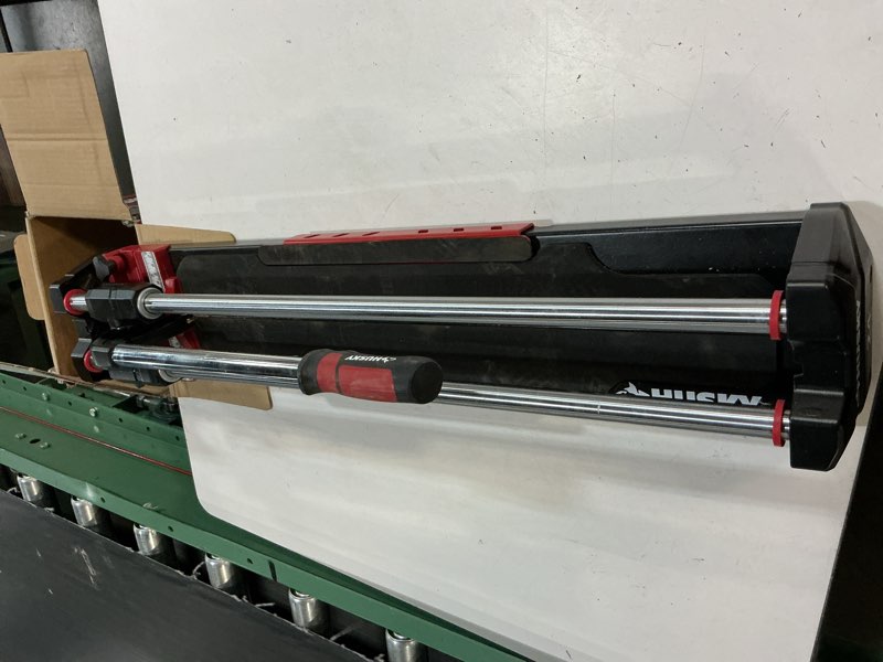 Condition photo showing Good Condition for 24 in. tile cutter with tungsten carbide blade and adjustable gauge