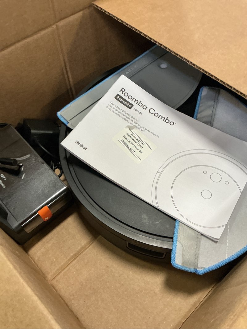 Condition photo showing As Is for iRobot Roomba Robot Vacuum and Mop Combo (Y0140) - Vacuums & mops, Easy to use, Power-Lifting Suction, Multi-Surface Floors, Smart Navigation, Cleans in Neat Rows, Self-Charging, Bagless, Space-Saving Roomba Y0140