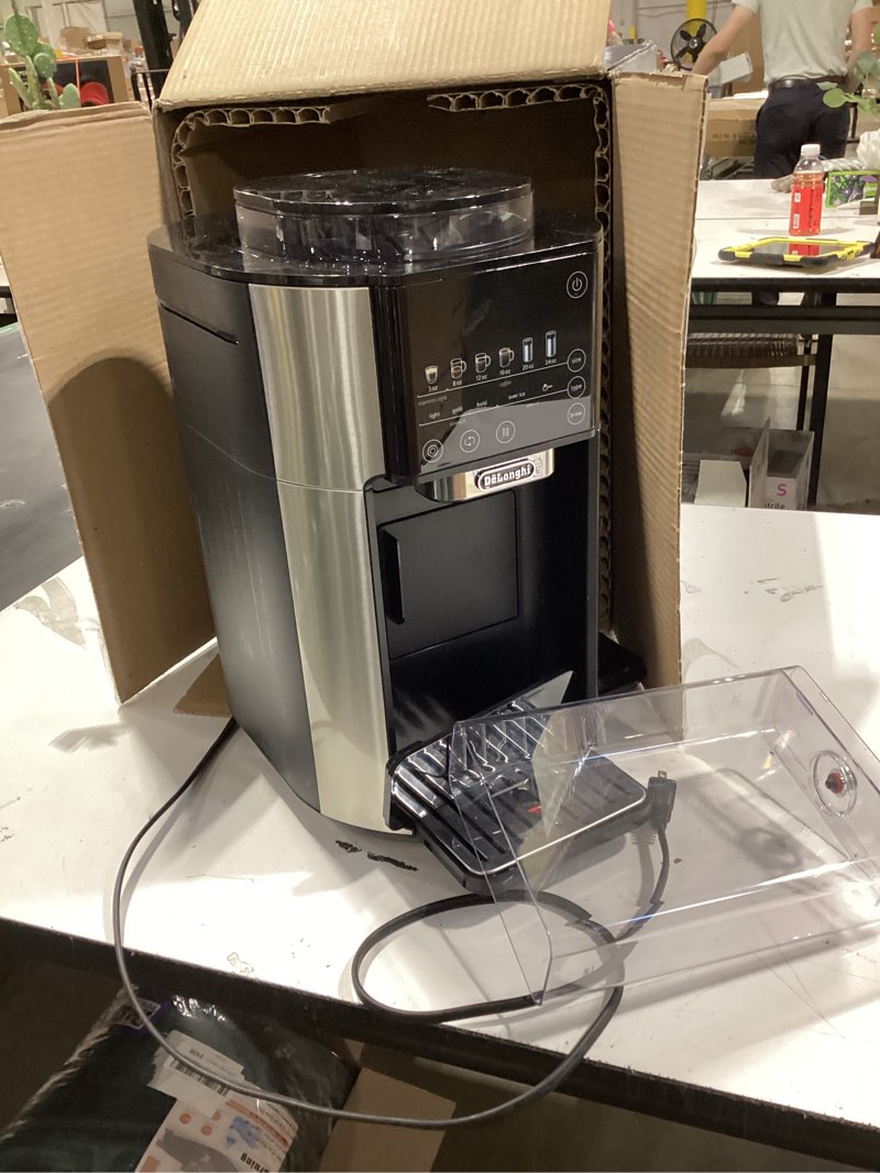 Condition photo showing As Is for de'longhi true brew drip coffee maker, built in grinder, single serve, 8 oz to 24 oz, hot or iced coffee, stainless, cam51025mb