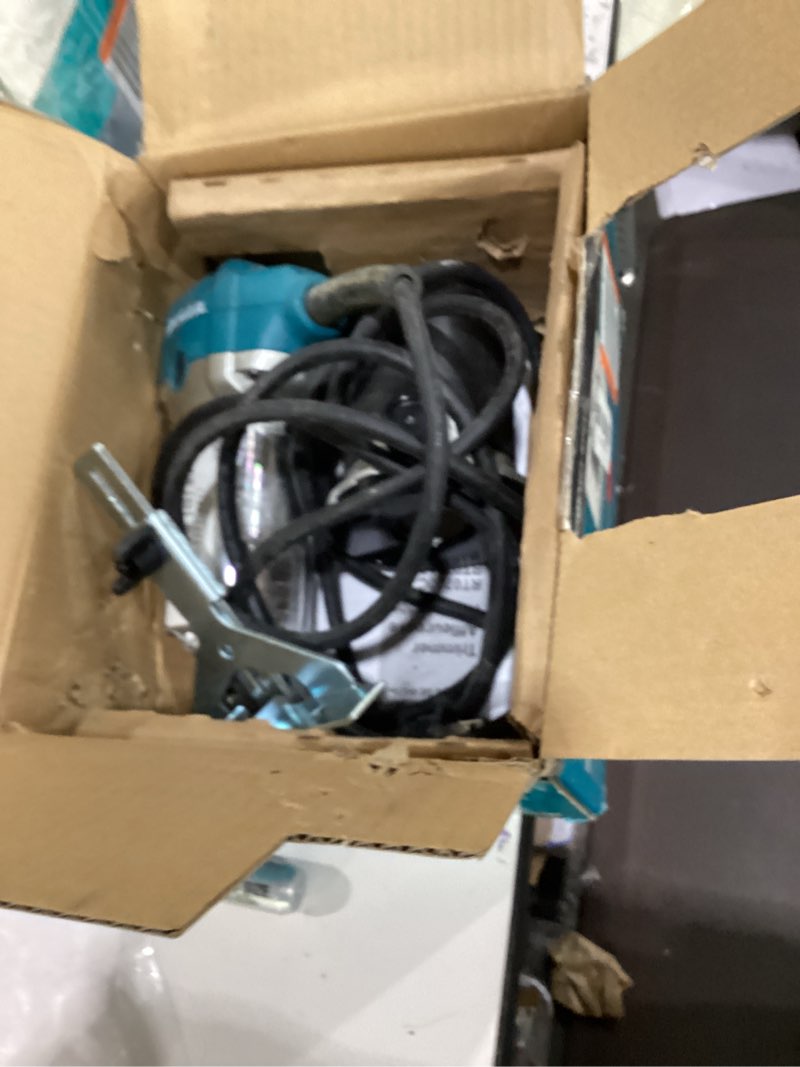 Condition photo showing As Is for Makita RT0701C 1-1/4 HP Compact Router 0 Tool