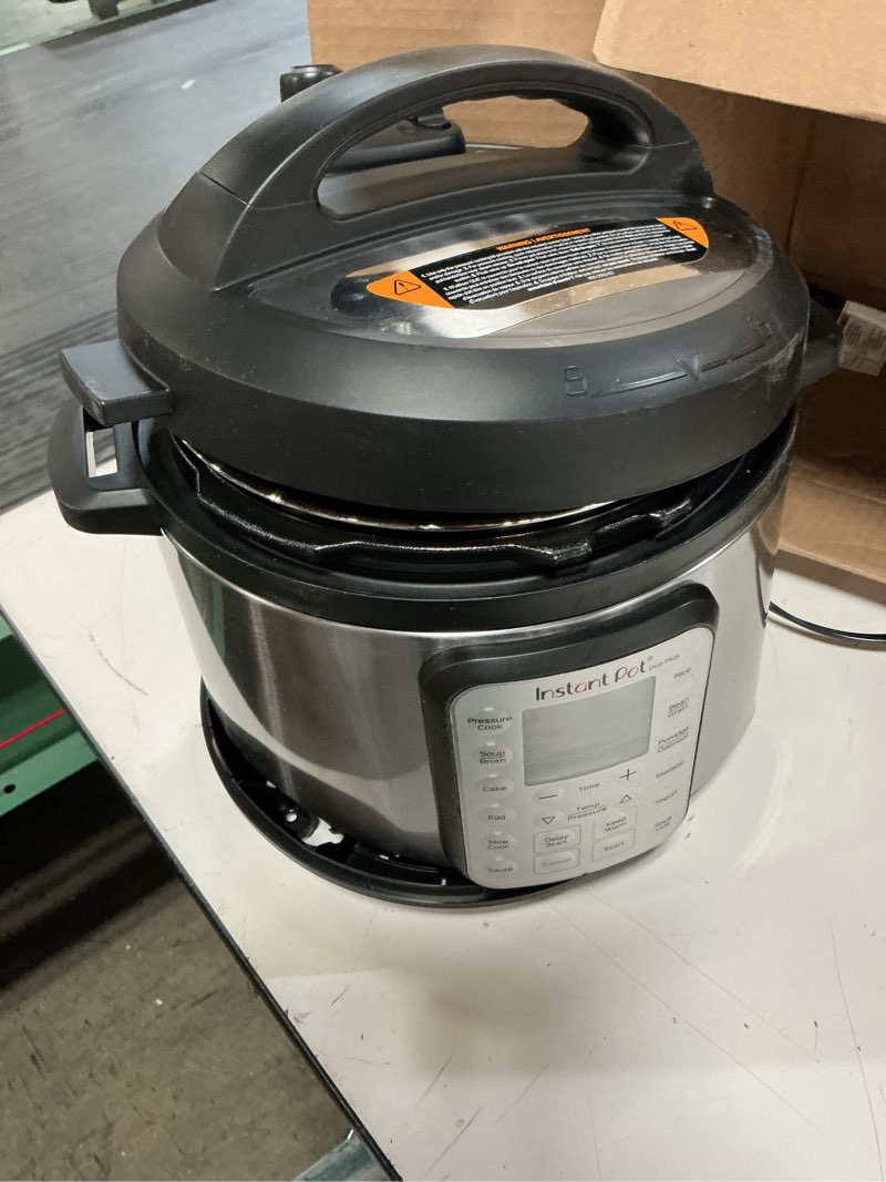 Condition photo showing As Is for instant pot duo 7-in-1 electric pressure cooker, slow cooker, rice, steamer, sauté, yogurt maker, warmer & sterilizer, includes app with over 800 recipes, stainless steel, 6 quart
