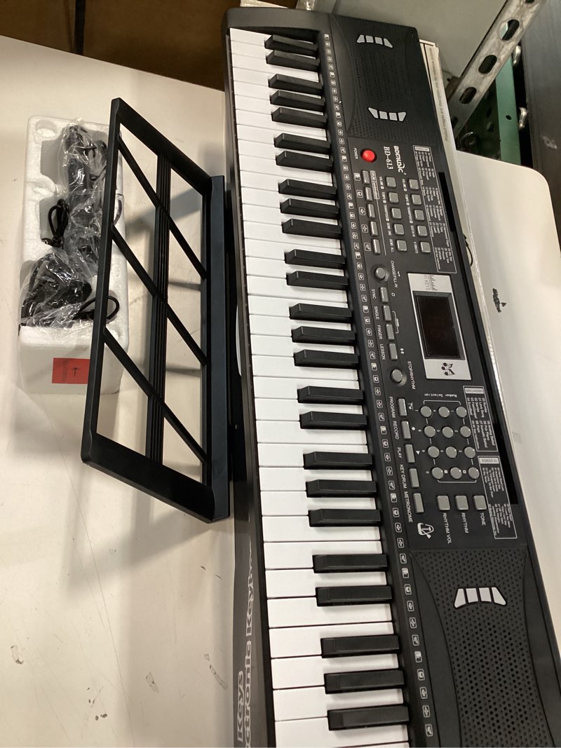 Condition photo showing Good Condition for 61 Keys Electronic Digital piano, Portable Keyboard Piano with Built-in Speaker and Microphone, Sheet Stand and Power Supply, Keyboard Piano Teaching Gift for Beginners Eelectric
